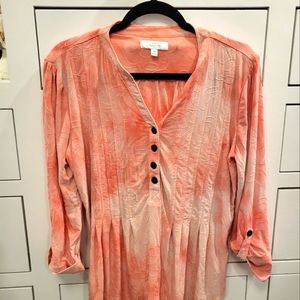 Pink and peach tie dyed 3/4 link sleeve four buttons up the front halfway into V